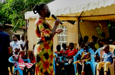Our Director, Anne Muyanga, Speaking at a Wanyange Community Gathering